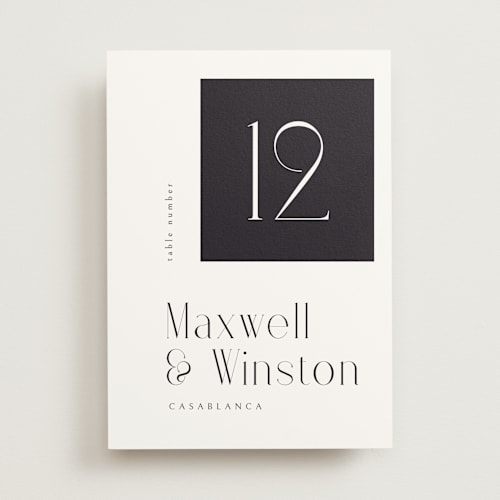 This is a tuxedo table numbers with standard by Ana de Sousa called wedding editorial printing on doublethick in standard