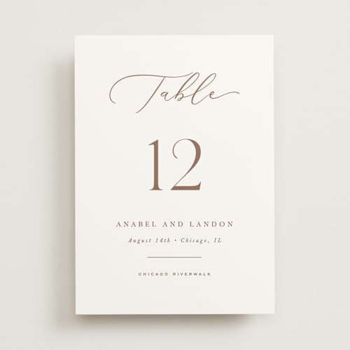 This is a pearl table numbers with standard by Hooray Creative called luxe script printing on doublethick in standard