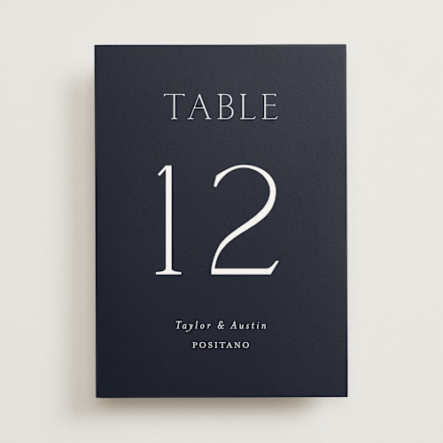 This is a navy table numbers with standard by Vanessa Doyle called in love printing on doublethick in standard