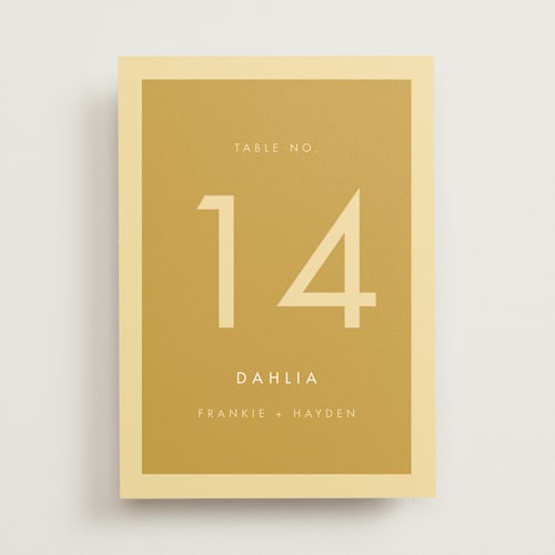 This is a buttercup table numbers with standard by Snow and Ivy called colorfield printing on doublethick in standard