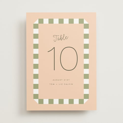 This is a peach table numbers with standard by Baumbirdy called boardwalk printing on doublethick in standard