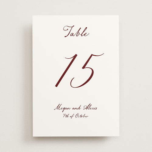 This is a wine table numbers with standard by Cass Loh called handwritten printing on doublethick in standard