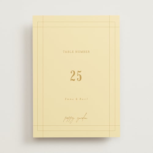 This is a butter table numbers with standard by Nazia Hyder called vintage label printing on doublethick in standard