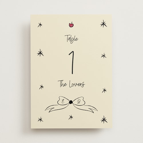 This is a champagne table numbers with standard by Helena Vitto called modern love printing on doublethick in standard