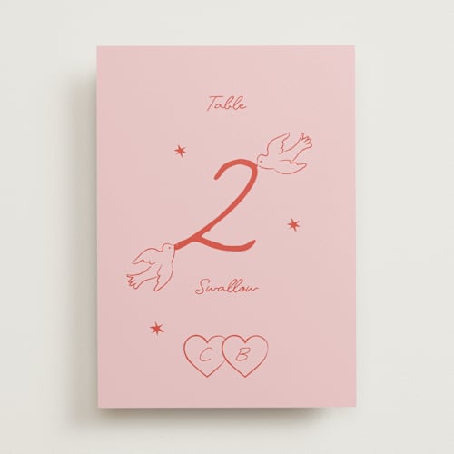 This is a peach table numbers with standard by Helena Vitto called the bird song printing on doublethick in standard