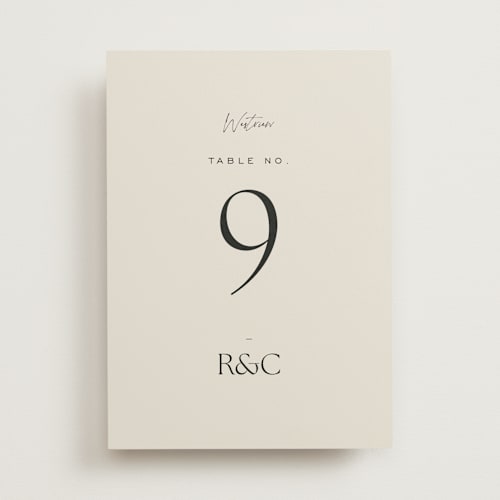 This is a sandstone table numbers with standard by Sara Hicks Malone called monogram edit printing on doublethick in standard