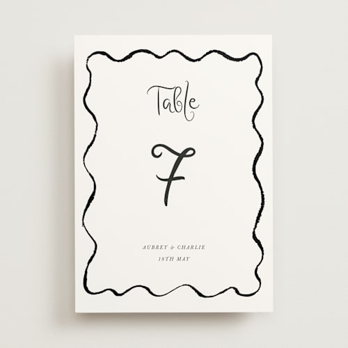 This is a tuxedo table numbers with standard by Cass Loh called quirky fun printing on doublethick in standard