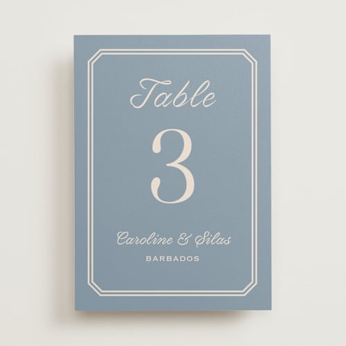 This is a french blue table numbers with standard by Carolyn MacLaren called bevel monogram printing on doublethick in standard
