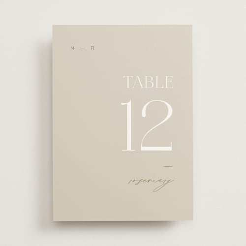 This is a natural table numbers with standard by Leah Bisch called oval printing on doublethick in standard