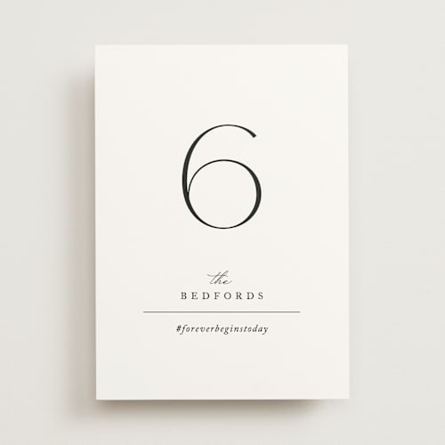 This is a pearl table numbers with standard by Jennifer Postorino called initial printing on signature in standard