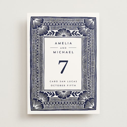 This is a navy table numbers with standard by Katharine Watson called block print frame printing on signature in standard