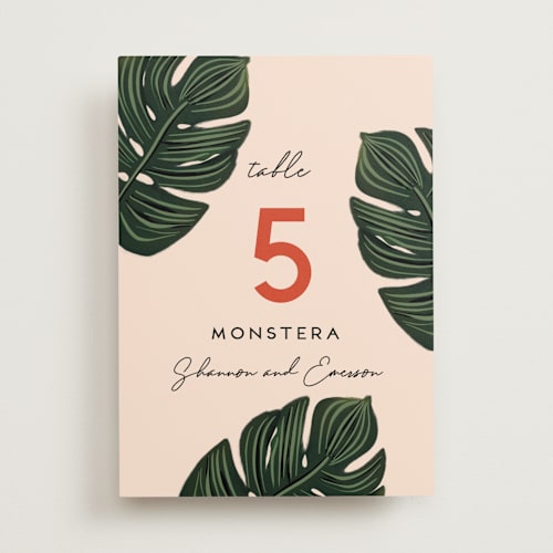 This is a coral table numbers with standard by Joanna Griffin called tropical oasis printing on signature in standard