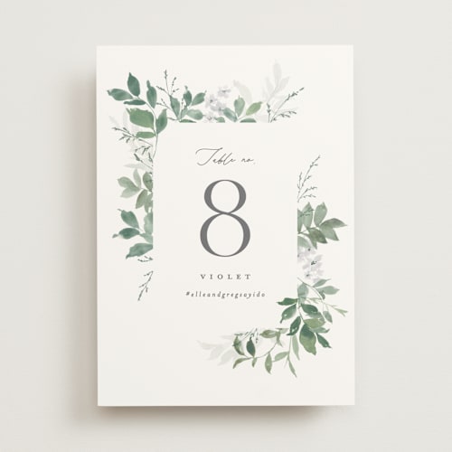 This is a fern table numbers with standard by Everett Paper Goods called grove printing on signature in standard