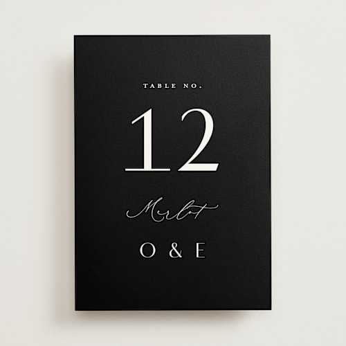 This is a onyx table numbers with standard by Emily Betts called modern classic names printing on doublethick in standard