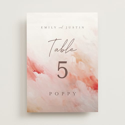 This is a blush table numbers with standard by Lucrecia Caporale called delicate brushstrokes printing on doublethick in standard