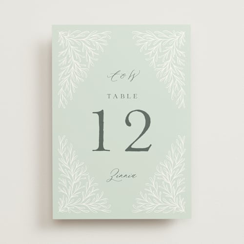 This is a sage table numbers with standard by Kristen Knechtel called fairy forest printing on doublethick in standard