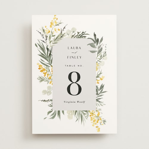 This is a dandelion table numbers with standard by Everett Paper Goods called mimosa printing on doublethick in standard