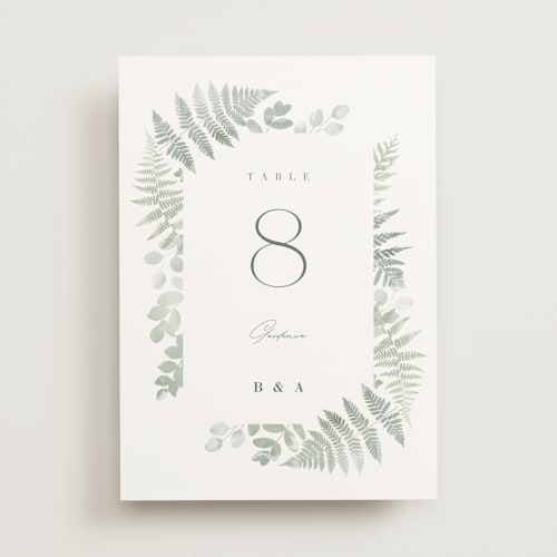 This is a fern table numbers with standard by Kristie Kern called gilded woodland printing on doublethick in standard
