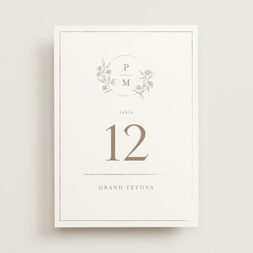This is a taupe table numbers with standard by Chris Griffith called monogrammed printing on doublethick in standard