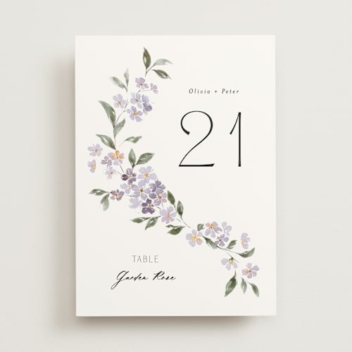 This is a periwinkle table numbers with standard by Itsy Belle Studio called sweeping vine printing on doublethick in standard