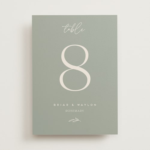 This is a sage table numbers with standard by Erica Krystek called soft arch printing on doublethick in standard