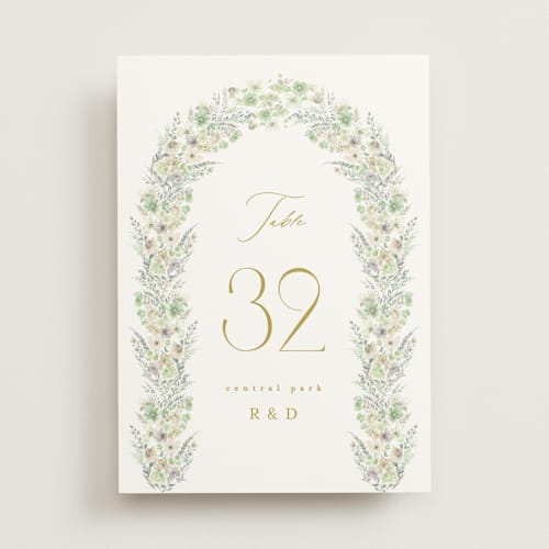 This is a greenery table numbers with standard by Phrosné Barwood called floral arch printing on doublethick in standard