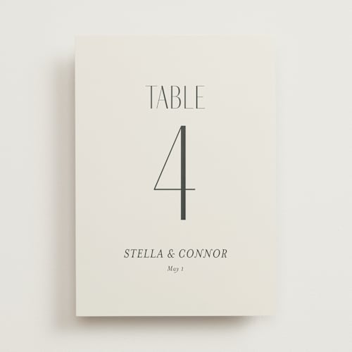 This is a porcelain table numbers with standard by Jennifer Postorino called unity printing on doublethick in standard