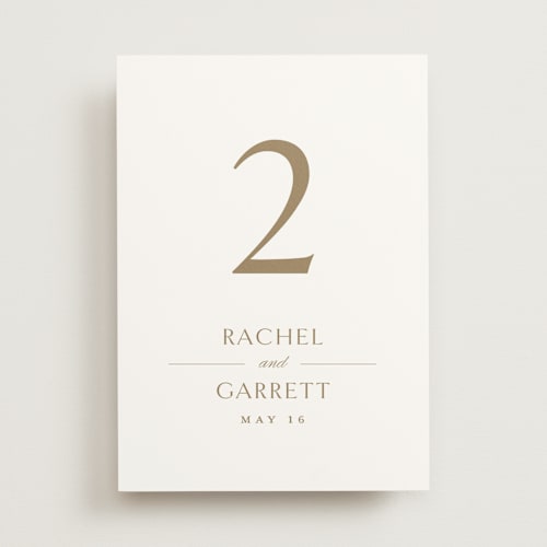 This is a champagne table numbers with standard by Jennifer Postorino called soft sprigs printing on doublethick in standard