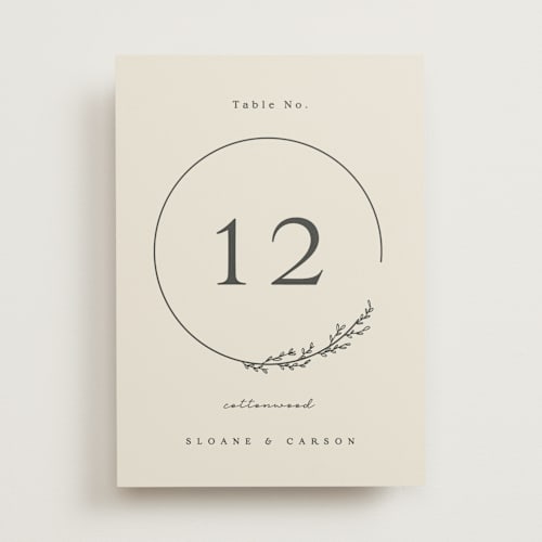 This is a almond table numbers with standard by Brianne Larsen called branched printing on doublethick in standard