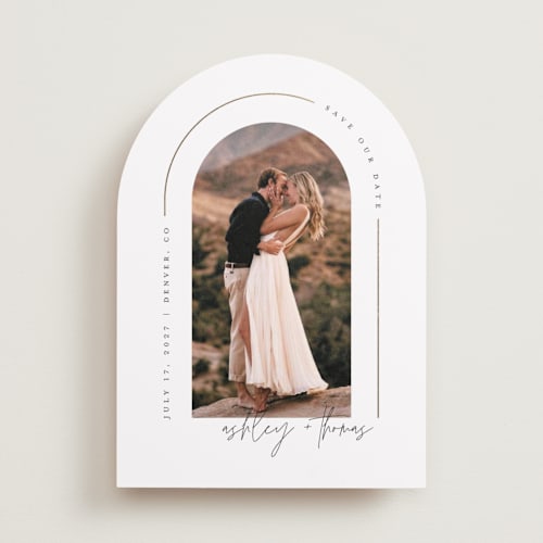 This is a silk foil stamped save the date cards with foil pressed by Kelly Schmidt called arch printing on recycled smooth signature in standard
