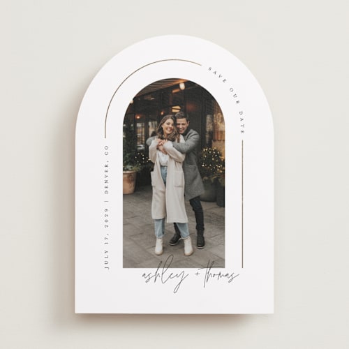 This is a silk foil stamped save the date cards with foil pressed by Kelly Schmidt called arch printing on recycled smooth signature in standard