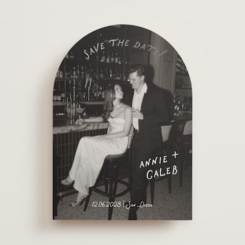 This is a ivory foil stamped save the date cards with foil pressed by Stephanie Heinrich Godbout called lovers printing on recycled smooth signature in standard