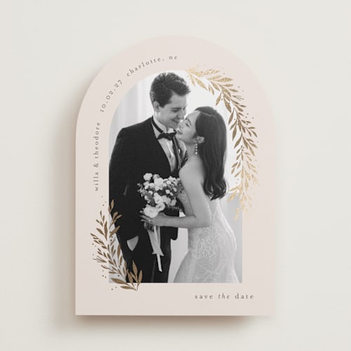 This is a linen foil stamped save the date cards with foil pressed by Laura Hankins called garland arch printing on recycled smooth signature in standard