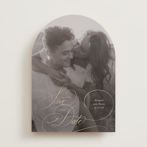 This is a cream foil stamped save the date cards with foil pressed by Hooray Creative called elegantly scripted printing on recycled smooth signature in standard