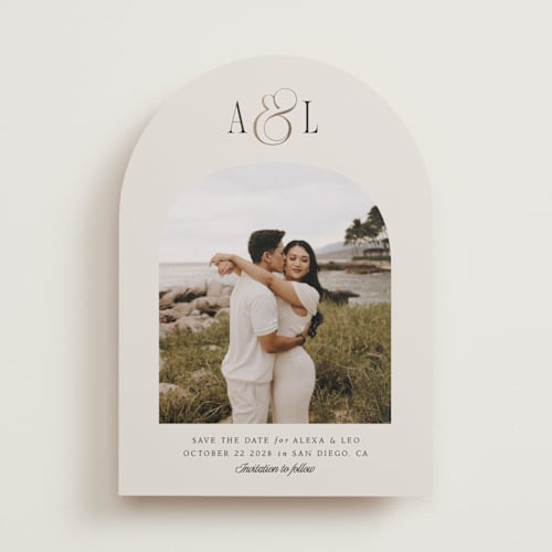 This is a cream foil stamped save the date cards with foil pressed by Robert and Stella called skye printing on recycled smooth signature in standard