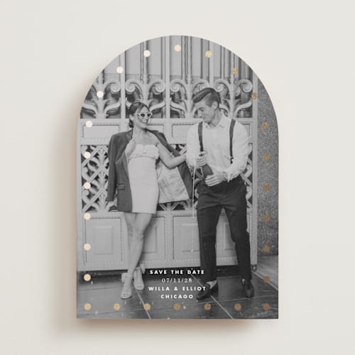 This is a quartz foil stamped save the date cards with foil pressed by Baumbirdy called spotlight printing on recycled smooth signature in standard