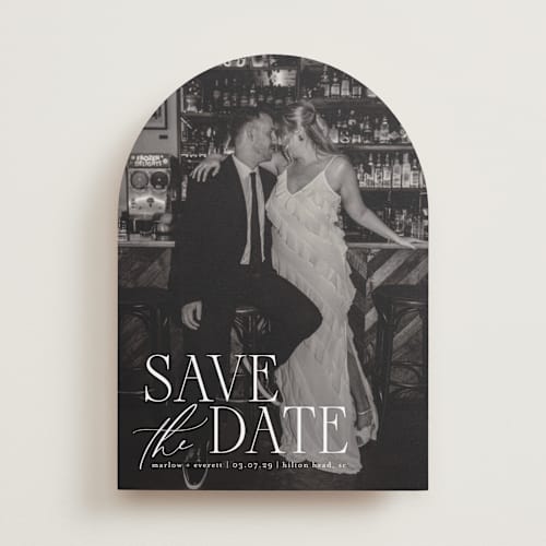 This is a silk save the date with standard by Kelly Schmidt called scripted initials printing on recycled smooth signature in standard