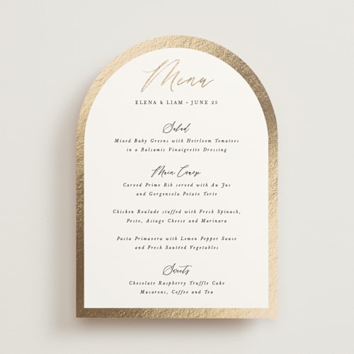This is a ivory menu cards with foil pressed by Hooray Creative called gold trim printing on signature in standard