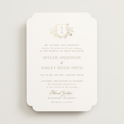 This is a champagne foil stamped wedding invitations with foil pressed by Cass Loh called floral crest printing on signature in standard