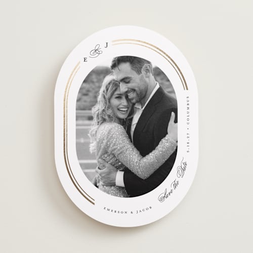 This is a opal foil stamped save the date cards with foil pressed by Emily Betts called framed oval printing on recycled smooth signature in standard