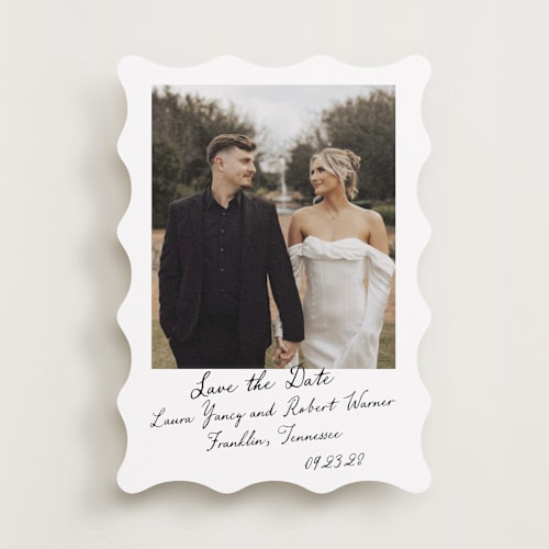 This is a snow save the date with standard by Sara Hicks Malone called vintage script printing on recycled smooth signature in standard