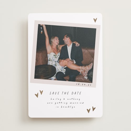 This is a ink foil stamped save the date cards with foil pressed by Ashley Iwafuchi called scribbled hearts printing on recycled smooth signature in standard