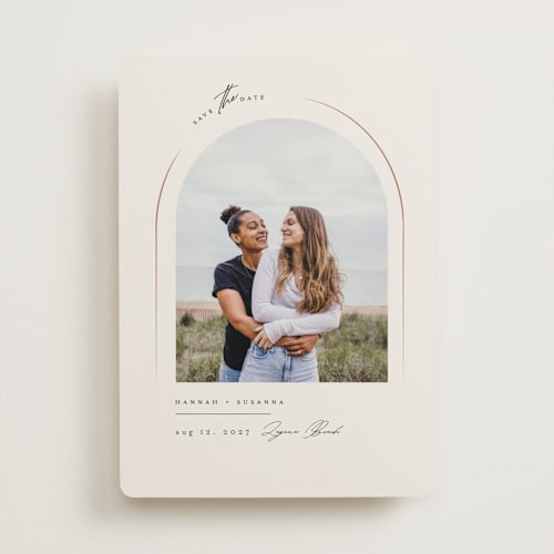 This is a champagne save the date with standard by Benita Crandall called l'arch printing on recycled smooth signature in standard