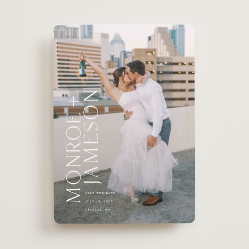 This is a quartz save the date with standard by Angela Garrick called carefree printing on recycled smooth signature in standard