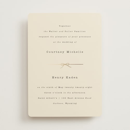This is a ivory foil stamped wedding invitations with foil pressed by Baumbirdy called bow tie printing on signature in standard
