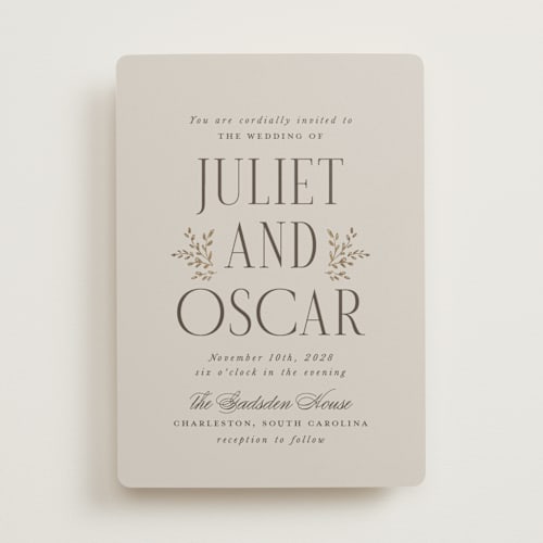 This is a pebble foil stamped wedding invitations with foil pressed by Laura Hankins called enchanted printing on signature in standard