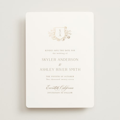 This is a champagne foil stamped save the date cards with foil pressed by Cass Loh called floral crest printing on signature in standard