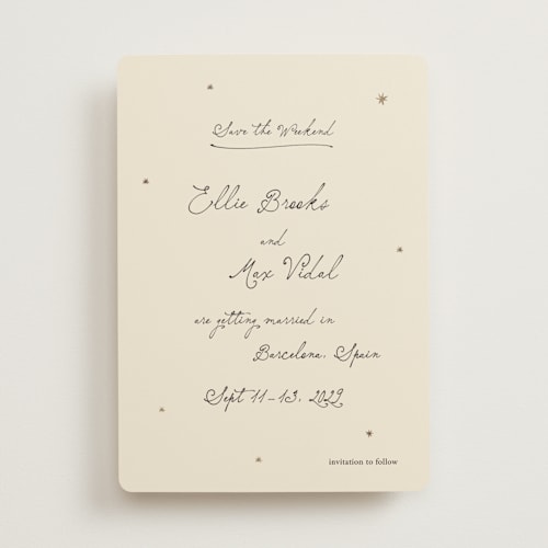 This is a noir foil stamped save the date cards with foil pressed by Ani Somi called written in the stars printing on signature in standard