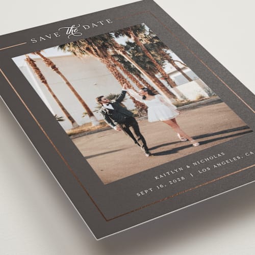 This is a graphite foil stamped save the date cards with foil pressed by Melanie Kosuge called mulholland printing on recycled smooth signature in grand