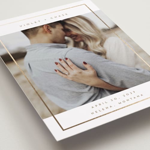 This is a latte foil stamped save the date cards with foil pressed by Rebecca Durflinger called contempo frame printing on recycled smooth signature in grand